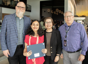 Ekboti with faculty members John Hartgraves, Karima Lalani and Jim Condon at the SPH Awards of Excellence ceremony