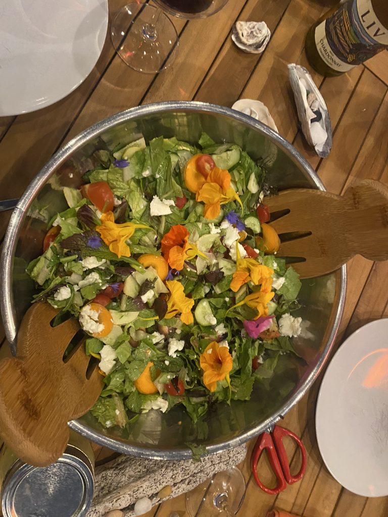 a fresh salad in a bowl on a table