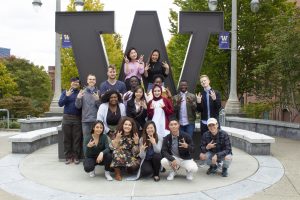 UW Tacoma's student government group picture in front of a campus W